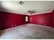 Bright bonus room featuring neutral carpeting, recessed lighting, and a large window at 2112 Merganser Ct, North Las Vegas, NV 89084