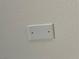 Close up of ceiling texture and electrical box cover at 2112 Merganser Ct, North Las Vegas, NV 89084