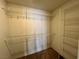 Walk-in closet featuring carpet and built-in wire shelving for optimal storage at 2112 Merganser Ct, North Las Vegas, NV 89084