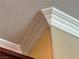 Close-up showcasing detailed crown molding adding architectural interest to the home's interior at 2112 Merganser Ct, North Las Vegas, NV 89084