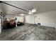 Clean and organized garage with plenty of storage space and lighting, offering practicality and convenience at 2112 Merganser Ct, North Las Vegas, NV 89084