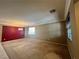 Bright living room features neutral walls and a chandelier at 2112 Merganser Ct, North Las Vegas, NV 89084