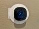 Ecobee smart thermostat centrally mounted and showing temperature set to 75 degrees in the home at 2112 Merganser Ct, North Las Vegas, NV 89084