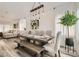 Stylish dining area with decorative lighting, a modern table, and an open floor plan at 2470 Lower Meadows Ave, Henderson, NV 89052