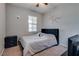 Cozy bedroom with neutral walls, a comfortable bed, and a stylish starburst wall decal at 253 Kindly Way, Henderson, NV 89011