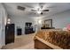 Bright main bedroom offers a ceiling fan, carpet and lots of closet space at 253 Kindly Way, Henderson, NV 89011