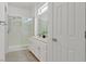 Bathroom featuring double sinks, shower, and a sliding glass door at 2573 Grandville Ave, Henderson, NV 89052