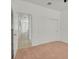 Bedroom featuring plush carpet, sliding closet doors, and neutral paint at 2573 Grandville Ave, Henderson, NV 89052