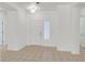 Bright and airy entrance hall with neutral tile flooring, fresh white walls, and plenty of natural light at 2573 Grandville Ave, Henderson, NV 89052