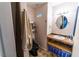 Full bathroom view with custom storage and shelving at 2612 Sonora St, Las Vegas, NV 89102