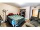 Bedroom with a bed, closet and seating area at 2612 Sonora St, Las Vegas, NV 89102