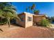 Exterior view of home, surrounded by foliage and landscaping at 2612 Sonora St, Las Vegas, NV 89102