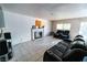Inviting living room featuring a fireplace, tile flooring, and ample space for seating at 2612 Sonora St, Las Vegas, NV 89102