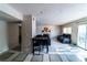 Spacious living room with open layout, tile floors, fireplace, and easy access to outdoor spaces at 2612 Sonora St, Las Vegas, NV 89102