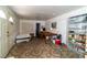 Open floor plan for living space, with a bedroom door in view at 2612 Sonora St, Las Vegas, NV 89102