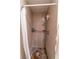 A tiled shower stall with a shower head and a white shower curtain at 2612 Sonora St, Las Vegas, NV 89102