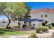 Well-maintained common area featuring green grass, a picnic table, and mature trees at 2725 S Nellis Blvd # 1056, Las Vegas, NV 89121