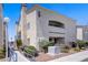 Charming condo with stucco exterior, well-maintained landscaping, and a inviting walkway at 2725 S Nellis Blvd # 1056, Las Vegas, NV 89121