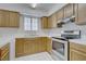 The well-lit kitchen features stainless steel appliances, and ample counter space at 2725 S Nellis Blvd # 1056, Las Vegas, NV 89121