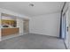 Bright living room with an open layout, flowing into the kitchen and featuring sliding door access to the outside at 2725 S Nellis Blvd # 1056, Las Vegas, NV 89121