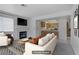 The open-concept living space features a fireplace, and seamless flow into the adjacent kitchen at 2725 S Nellis Blvd # 1056, Las Vegas, NV 89121