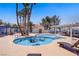 Inviting community pool with ample seating, swaying palms, and refreshing clear blue water at 2725 S Nellis Blvd # 1056, Las Vegas, NV 89121