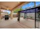 Cozy backyard patio area complete with a gazebo, grill, ceiling fan and outdoor seating at 2820 Goldcreek St, Henderson, NV 89052