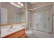 Bathroom with tub and shower combo and vanity with framed mirror and lighting at 2820 Goldcreek St, Henderson, NV 89052