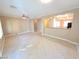 Spacious living room featuring tile flooring, neutral paint, and ample natural light at 2820 Goldcreek St, Henderson, NV 89052