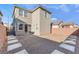 Private backyard featuring gravel, a brick patio, and concrete pavers stepping stones at 2824 Mozia Ct, Henderson, NV 89044