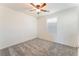 Bright bedroom with carpet flooring, ceiling fan, and natural light from the window at 2824 Mozia Ct, Henderson, NV 89044
