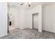 An airy bedroom features carpet, ceiling fan, ensuite access, and closet with sliding doors at 2824 Mozia Ct, Henderson, NV 89044
