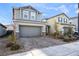 Charming two-story home with a well-manicured front yard and a paved driveway at 2824 Mozia Ct, Henderson, NV 89044