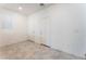 Unfurnished room with tile floors, neutral paint, and natural light from window at 2824 Mozia Ct, Henderson, NV 89044