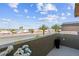 This balcony offers neighborhood views, potted flowers, and a tranquil outdoor space at 2935 Gaffer Film St, Las Vegas, NV 89156