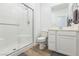 Bathroom features a glass-enclosed shower, white subway tile, and modern fixtures for a clean, contemporary design at 2935 Gaffer Film St, Las Vegas, NV 89156
