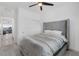 Bright bedroom with grey carpet, ceiling fan and ample natural light at 2935 Gaffer Film St, Las Vegas, NV 89156
