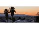 Enjoy the fantastic elevated city and mountain views from this property, highlighted by two mature palms at 2935 Gaffer Film St, Las Vegas, NV 89156