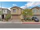 Attractive two-story home with a two car garage, desert landscaping, and an inviting facade at 2935 Gaffer Film St, Las Vegas, NV 89156