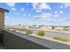 Distant mountain view overlooking a neighborhood street of homes with clear blue skies and white puffy clouds at 2935 Gaffer Film St, Las Vegas, NV 89156