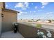 Scenic neighborhood street view with palm trees and mountains under a beautiful blue sky at 2935 Gaffer Film St, Las Vegas, NV 89156