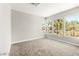 Bright bedroom with large windows offering natural light and neighborhood views at 3526 Harbor Tides St, Las Vegas, NV 89147