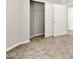 Bright bedroom with plush carpeting and a sliding closet door at 3526 Harbor Tides St, Las Vegas, NV 89147