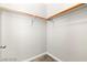 Empty closet with neutral paint, wood shelving, and carpeted floor at 3526 Harbor Tides St, Las Vegas, NV 89147