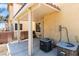 Covered patio showcasing the air conditioning units and stucco wall at 3526 Harbor Tides St, Las Vegas, NV 89147