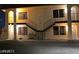 Exterior view of a two story apartment building, captured at night with stairs to the second floor at 4150 Solteros St, Las Vegas, NV 89103
