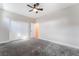 Carpeted bedroom with closet and a modern ceiling fan at 4294 Eagle Summit Ave, Las Vegas, NV 89141