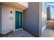 Inviting entryway with a modern door and stylish outdoor bench at 4294 Eagle Summit Ave, Las Vegas, NV 89141