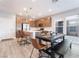 Stylish kitchen with stainless steel appliances and a modern dining table at 4294 Eagle Summit Ave, Las Vegas, NV 89141