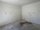 A clean bedroom features white walls and a dark floor at 4338 Caliente St # 8, Las Vegas, NV 89119